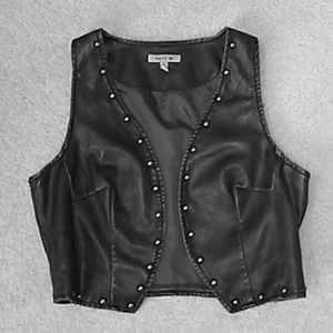 Leather studded vest, E-girl style.